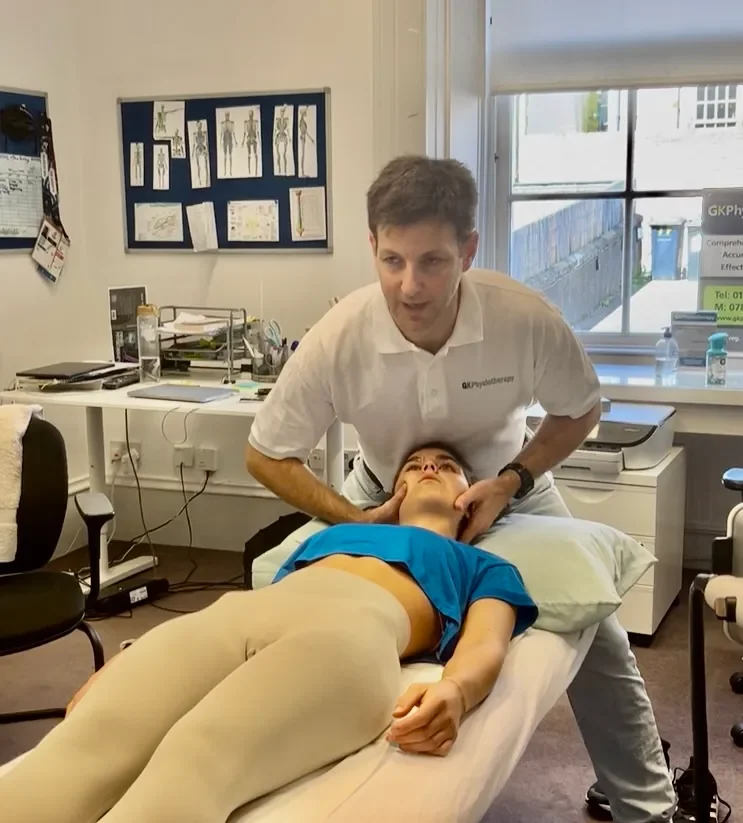 Chartered physiotherapist providing expert injury prevention consultation